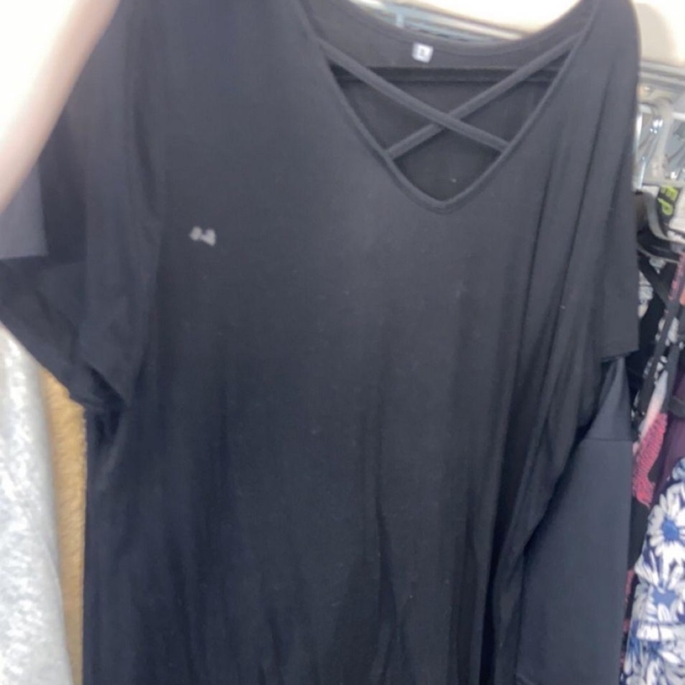 Black t shirt with a small stain